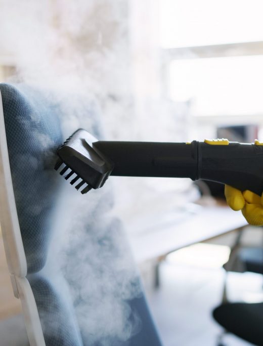 professional cleaning service person using steam cleaner office (1)